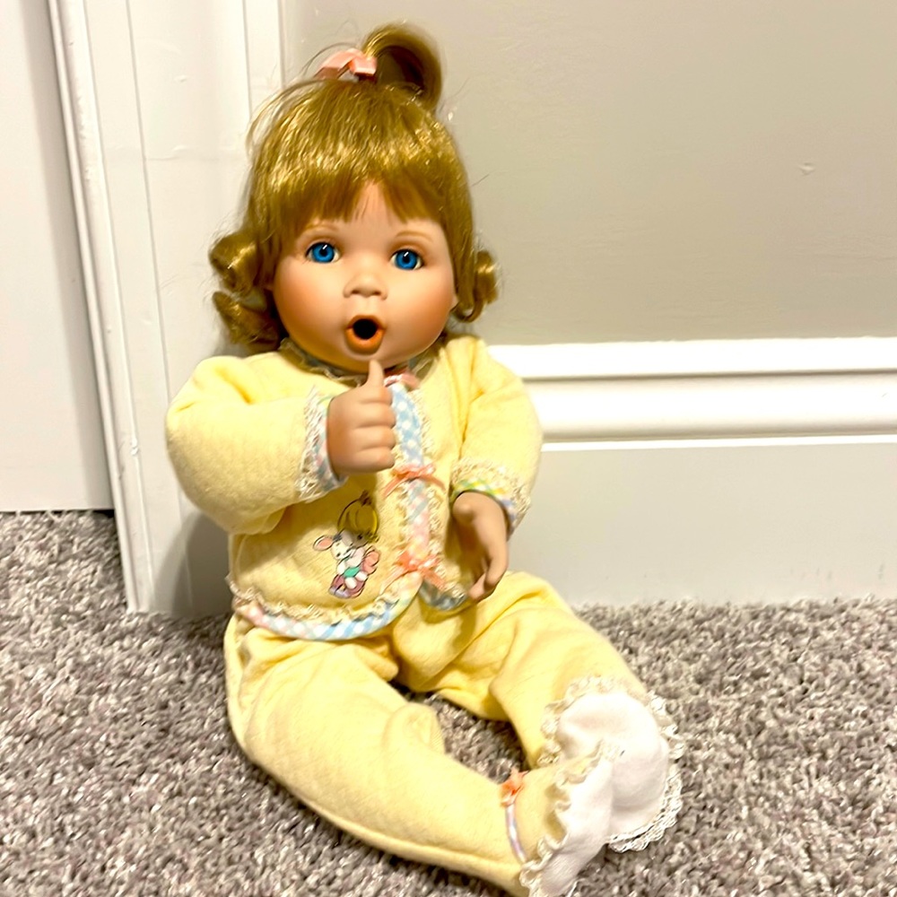 “Jesus Loves Me” porcelain doll